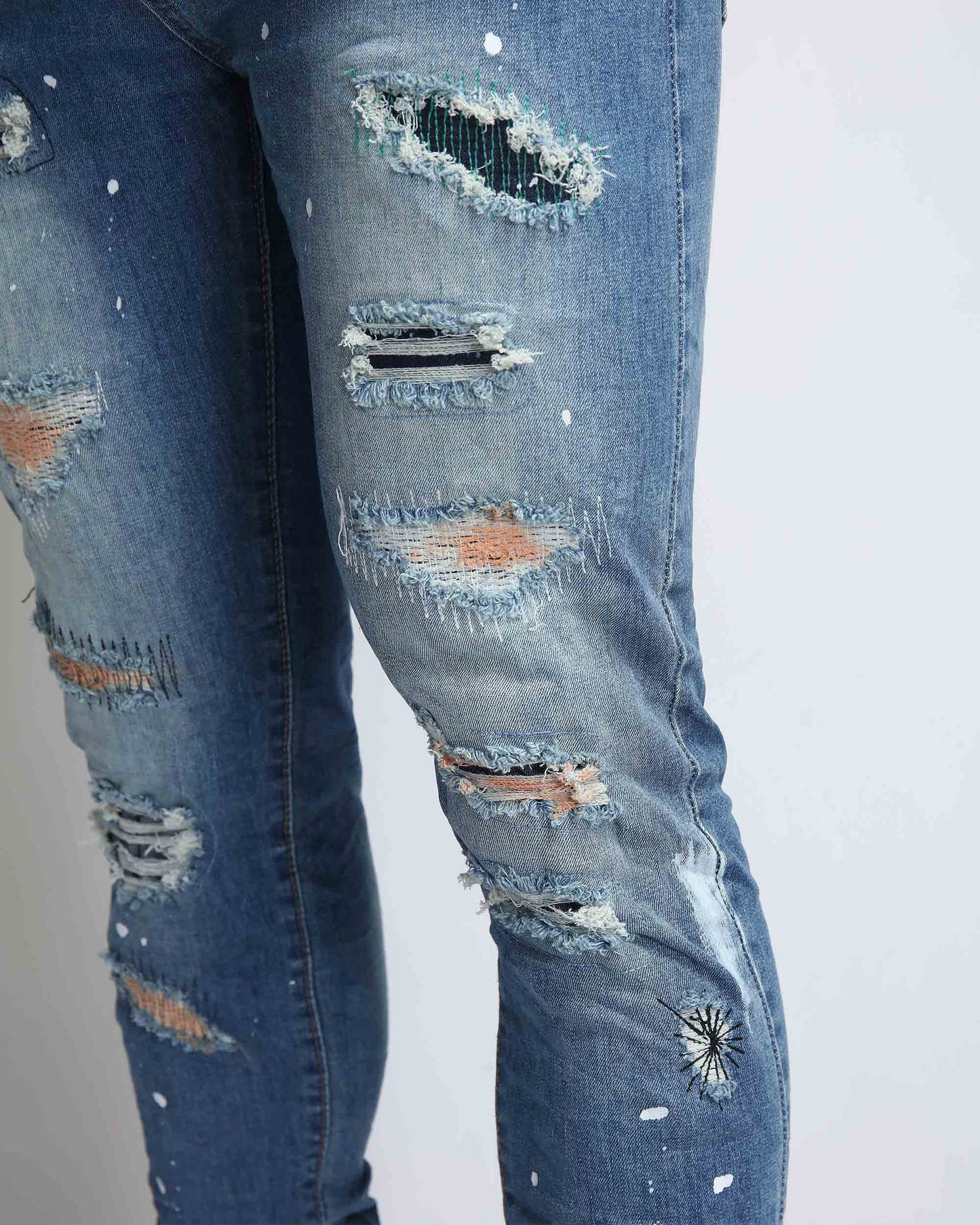 Medium Wash Distressed Ripped Blue Jeans