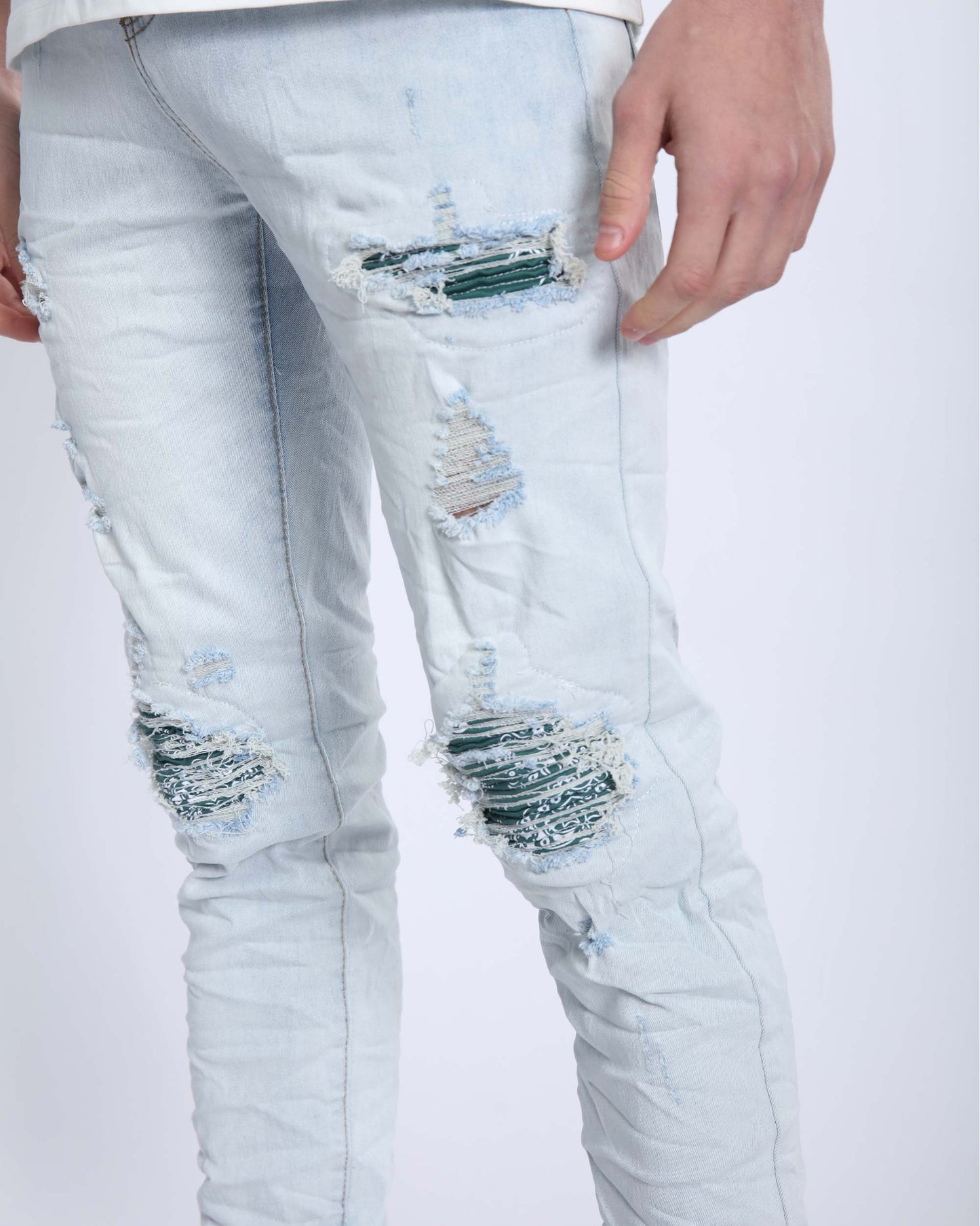 Light Wash Ripped Blue Jeans with Green Cashew flower patch